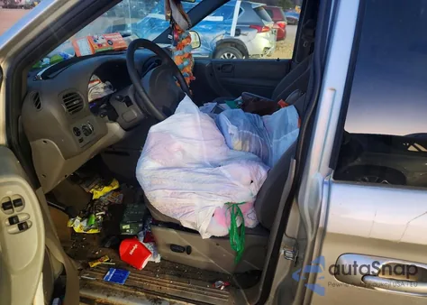 2003 Dodge Grand Caravan Sport из США, поврежденный, VIN 2D4GP44L73R184064